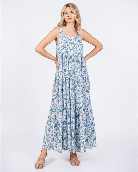 Woman wearing a floral dress on a white background