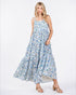 Woman wearing a floral dress on a white background