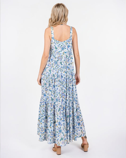 Woman wearing a floral dress on a white background