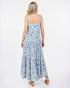 Woman wearing a floral dress on a white background