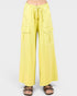 Yellow wide-leg pants with pockets on a white background
