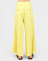 Yellow wide-leg pants on a white background