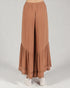 Brown wide-leg pants with ruffled bottom on a white background