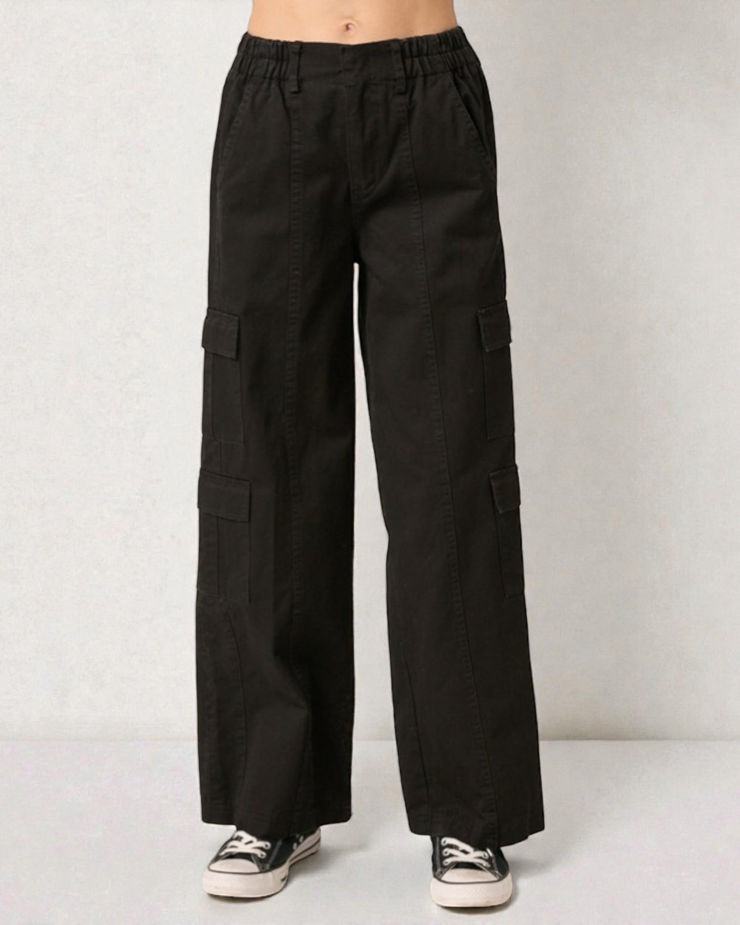 Black cargo pants on a plain background