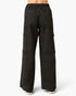 Black wide-leg cargo pants with an elastic waistband, shown from the back on a model against a light gray background.