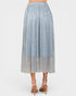 Light blue patterned skirt worn by a person on a white background