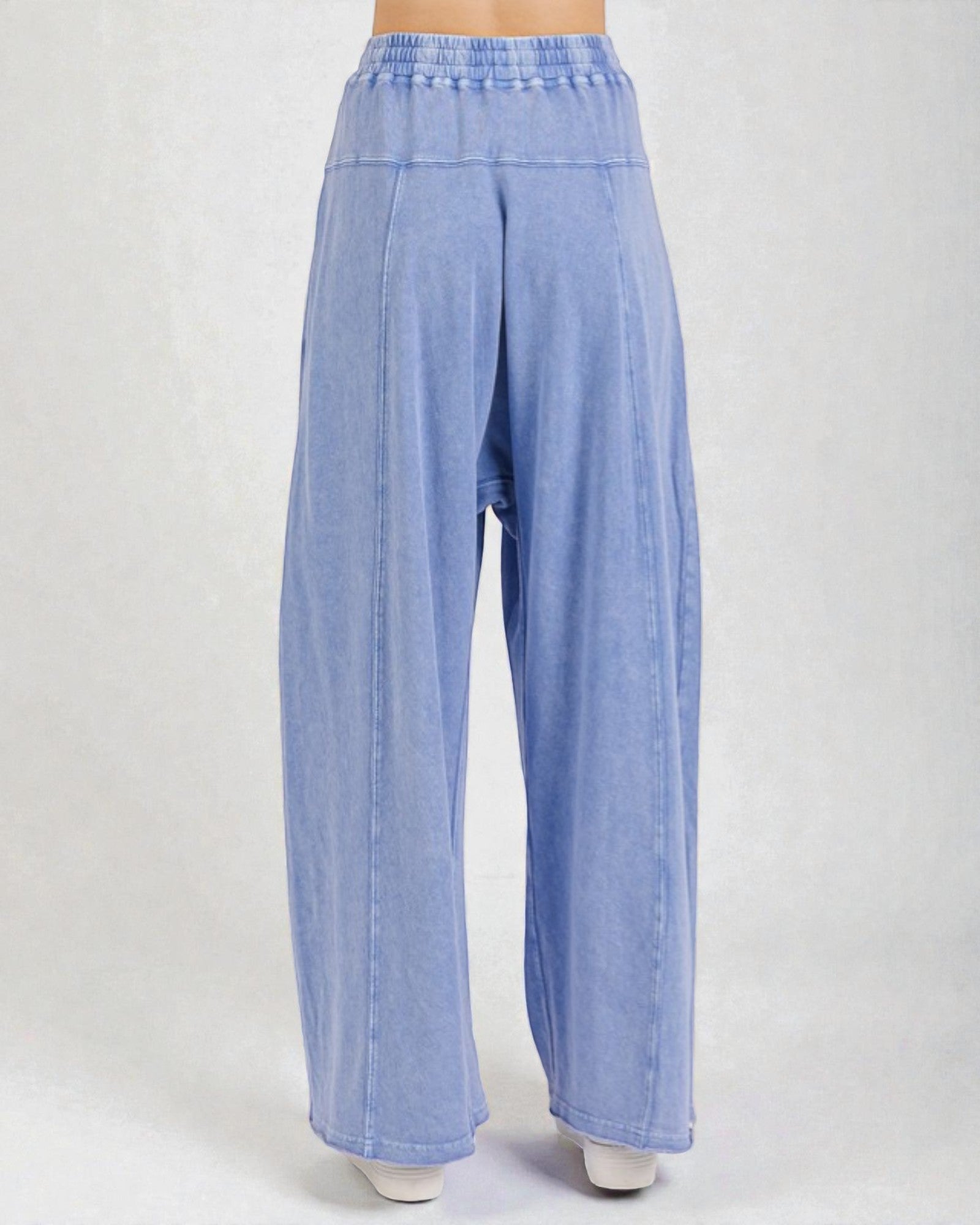 Light blue wide-leg jeans on a white background