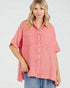 Woman wearing a pink checkered shirt on a white background