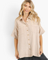 Beach Rose Co. sand cotton gauze oversized shirt with short sleeves, chest pockets, and a collared button-down front.