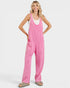 Woman wearing a pink overalls on a white background