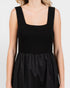Black sleeveless dress on a plain background