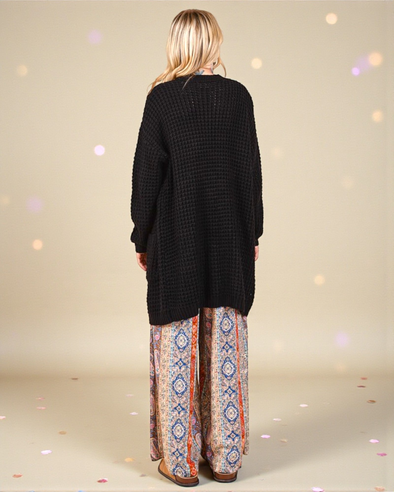 Cardigan long ouvert noir sur le devant