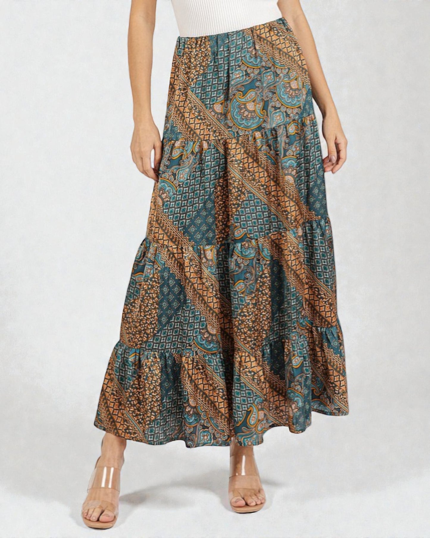 Woman wearing a patterned skirt on a white background