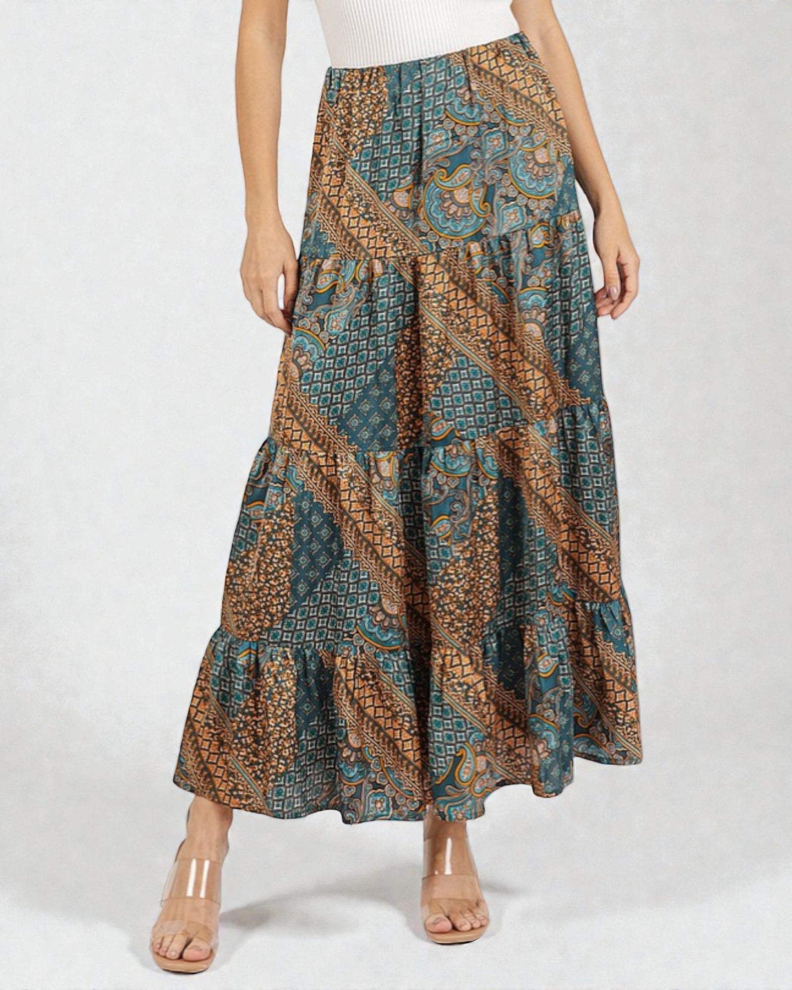 Woman wearing a patterned skirt on a white background