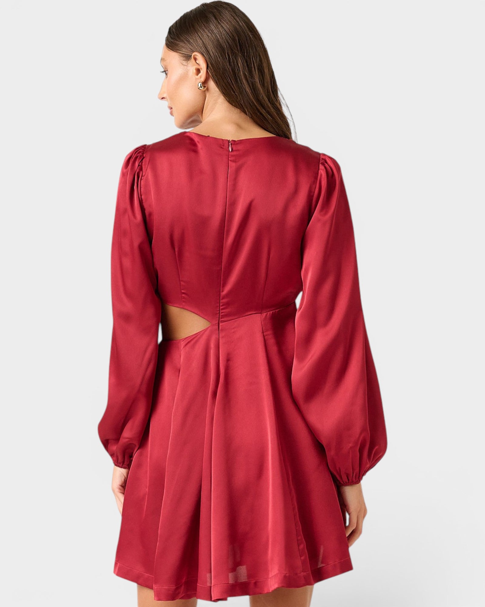 Red dress with cut-out design on a white background