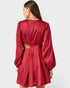 Red dress with cut-out design on a white background