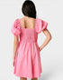 Pink dress with puff sleeves on a white background