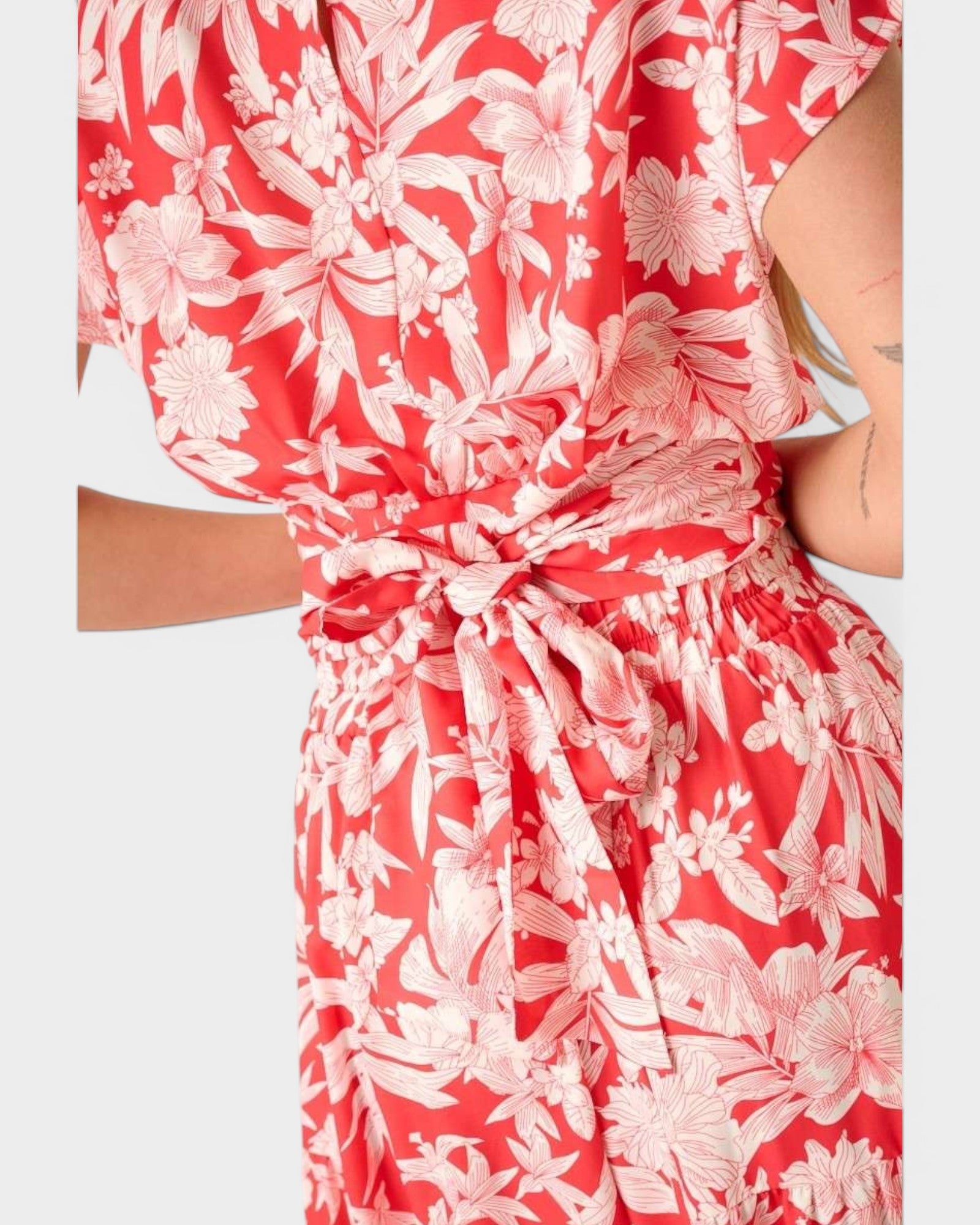 Red floral dress with a white background