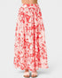 Floral patterned skirt with red and white colors on a plain background