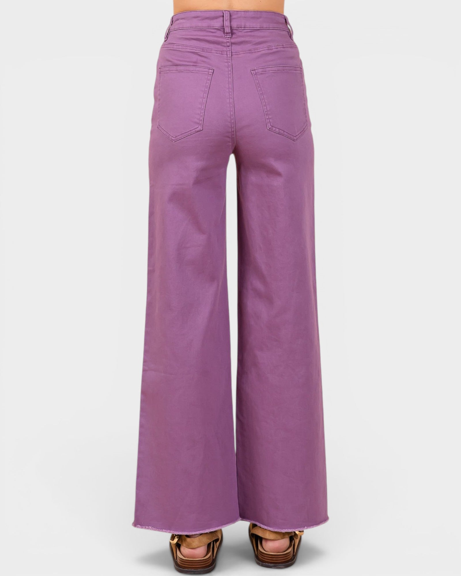 Purple wide-leg jeans on a white background