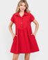 Woman wearing a red dress with a white background