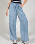 Light blue denim wide-leg pants worn by a person on a plain background