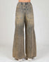 Wide-leg jeans on a plain background