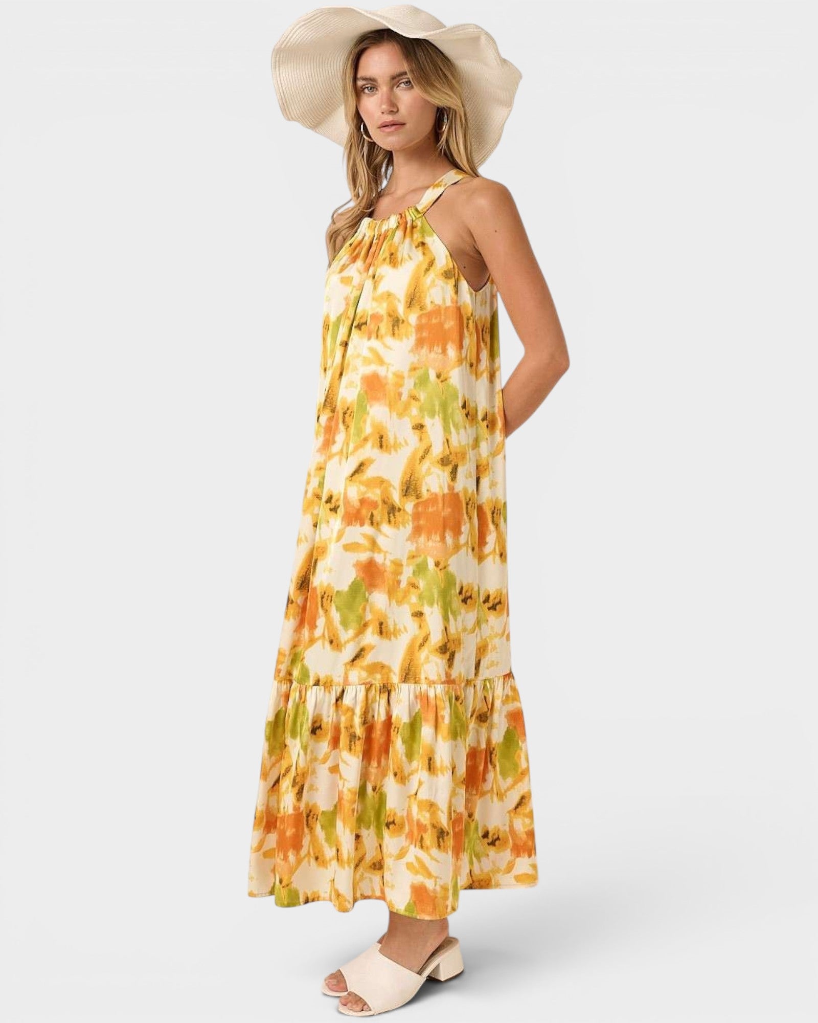 Woman wearing a floral dress with a white background