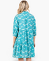 Beach Rose Co. seagreen babydoll dress with white zebra print, collared neckline, and tiered skirt, back view