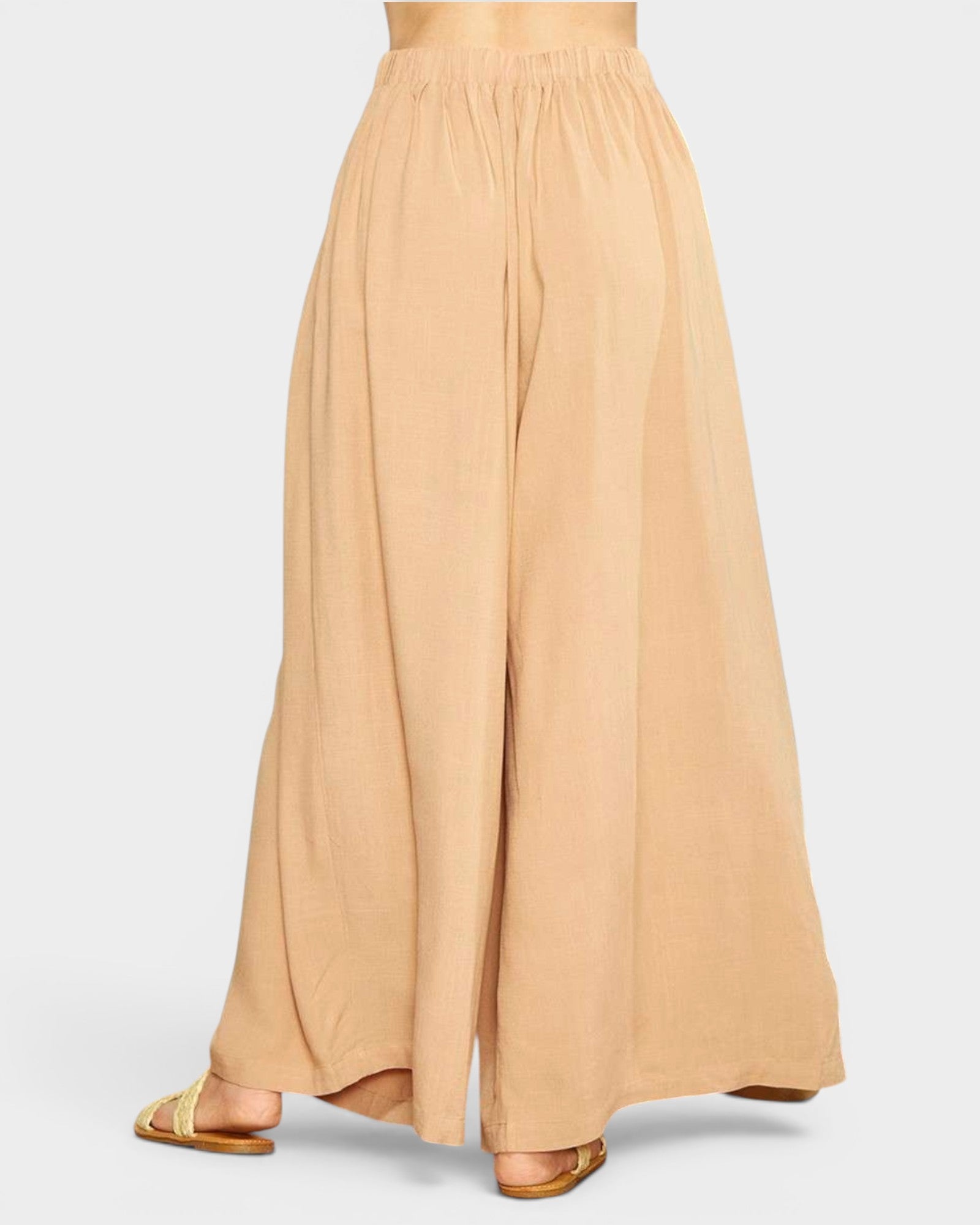 Beige wide-leg pants on a white background
