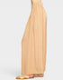 Beige wide-leg pants on a white background