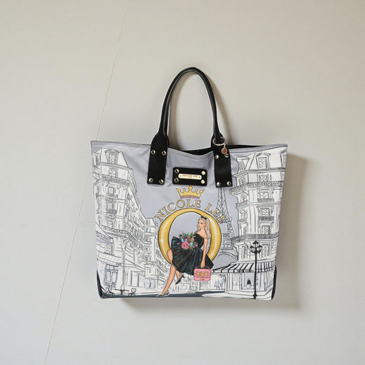 Tote bag with graphic design and brand logo on a light gray background