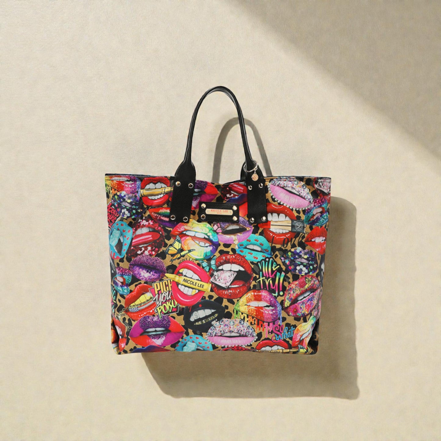 Colorful tote bag with lip print design on a beige background
