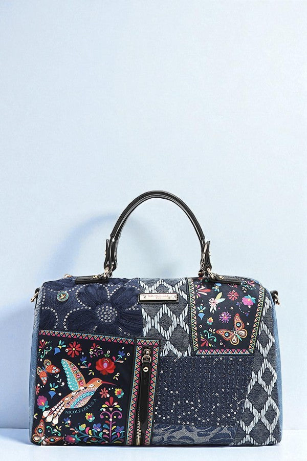 Handbag with floral and geometric patterns on a light blue background