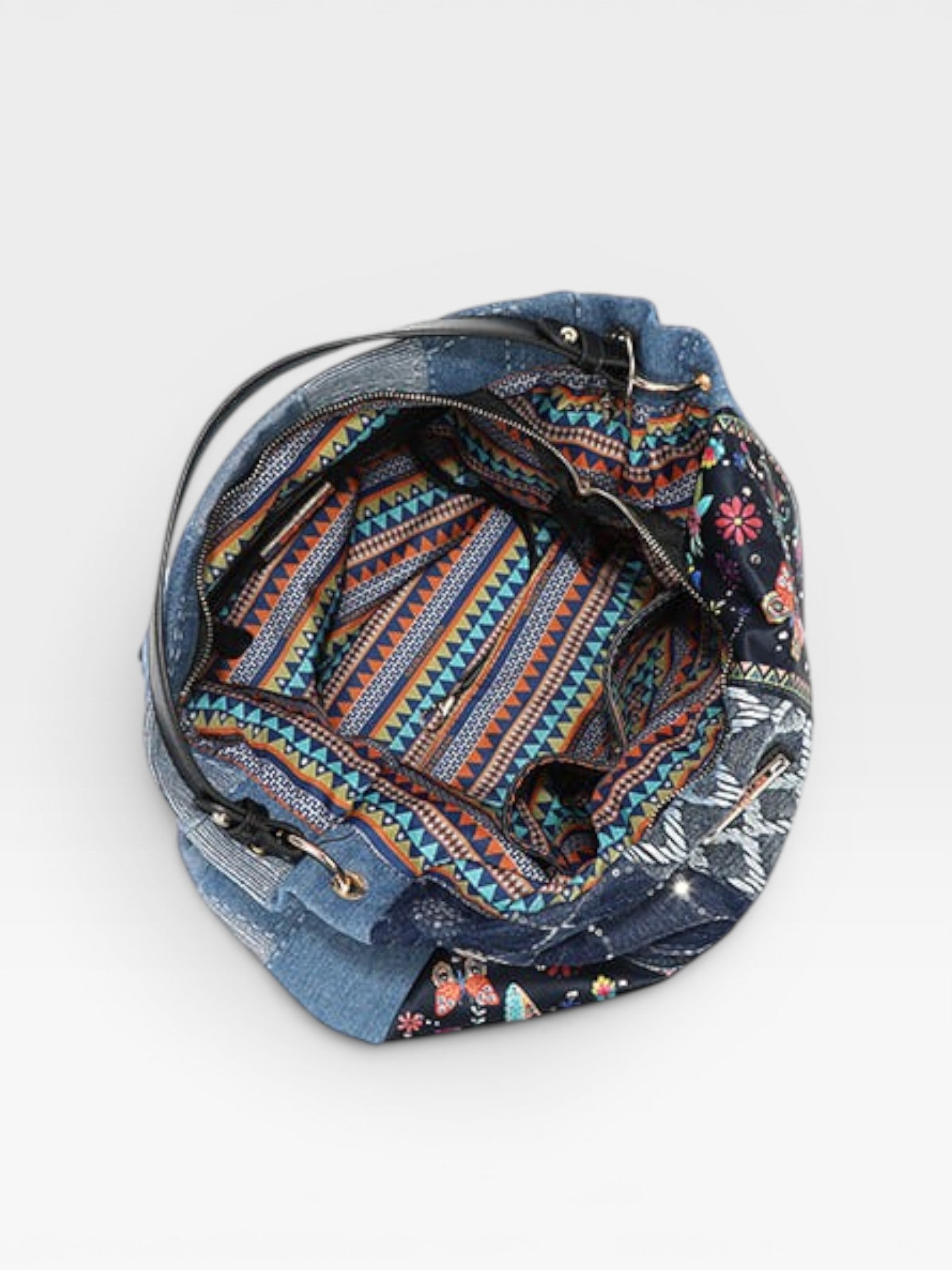 Blue patterned backpack on a white background