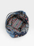 Blue patterned backpack on a white background
