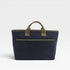 Navy tote bag with green accents on a white background