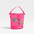 Pink bucket bag with patches on a light gray background