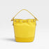Yellow bucket bag on a light gray background