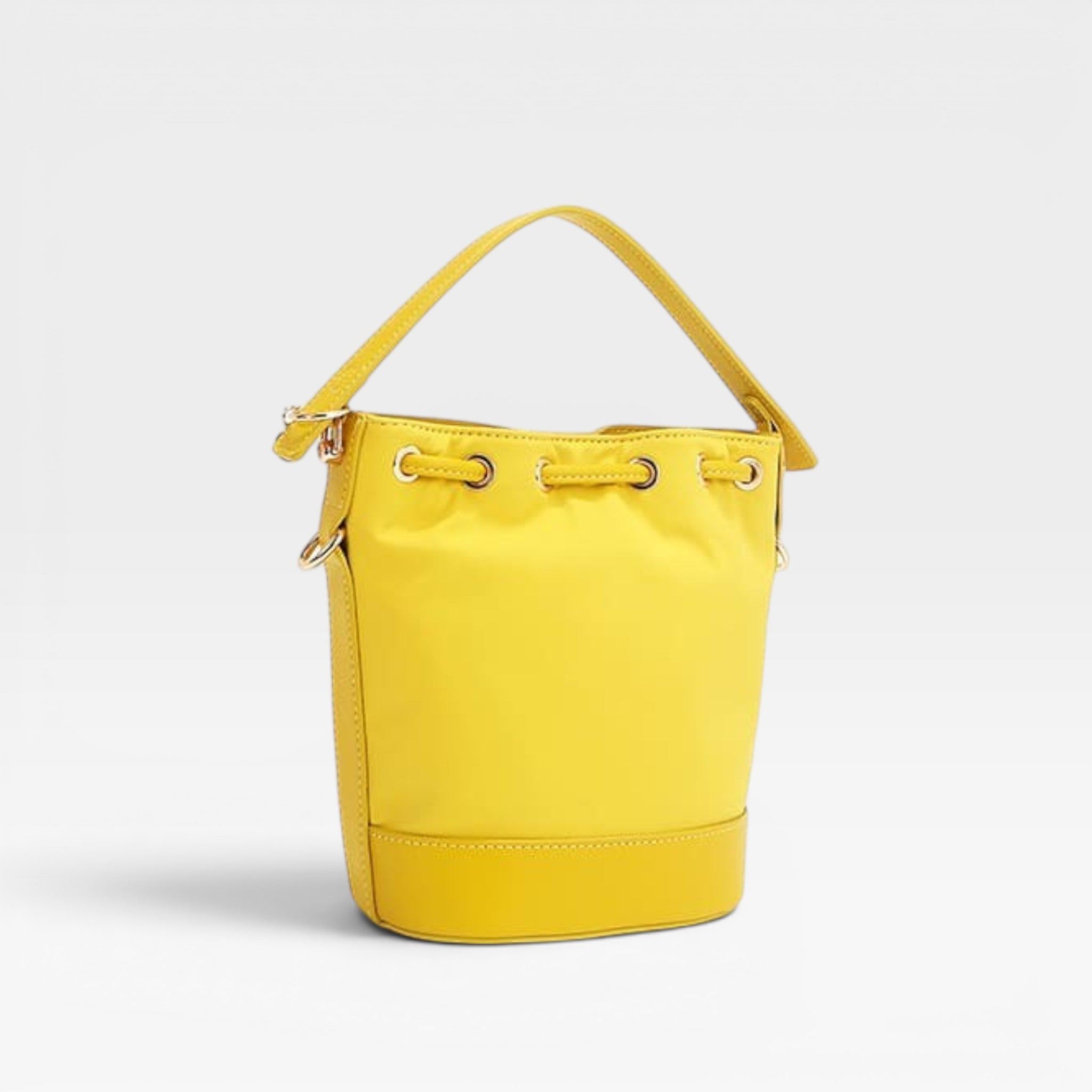 Yellow bucket bag on a light gray background