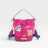 Pink bucket bag with colorful patches and a blue strap on a light gray background