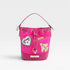 Pink bucket bag with patches on a light gray background