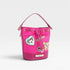 Pink bucket bag with patches on a light gray background