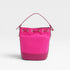 Pink bucket bag with gold accents on a light gray background