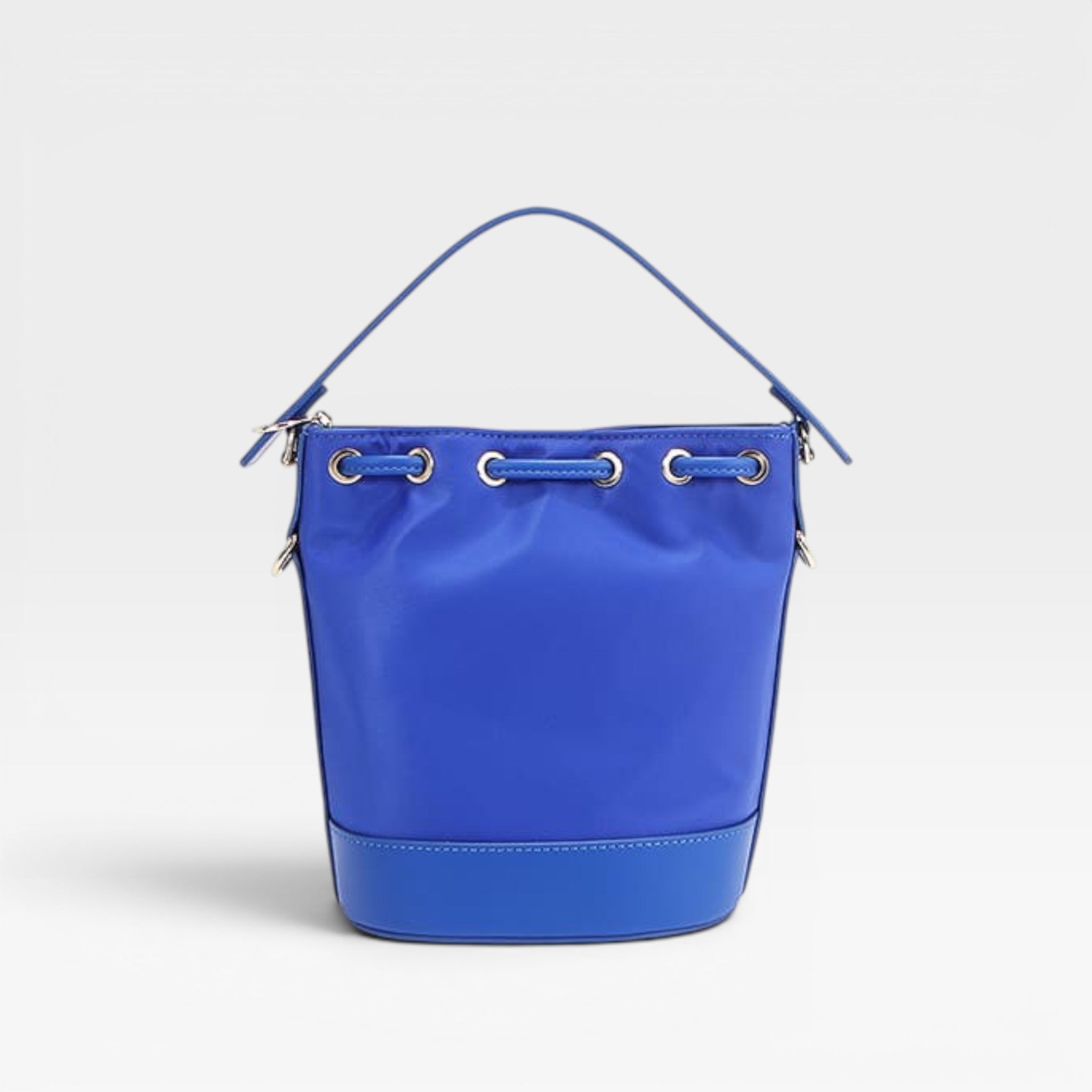Blue bucket bag on a light gray background