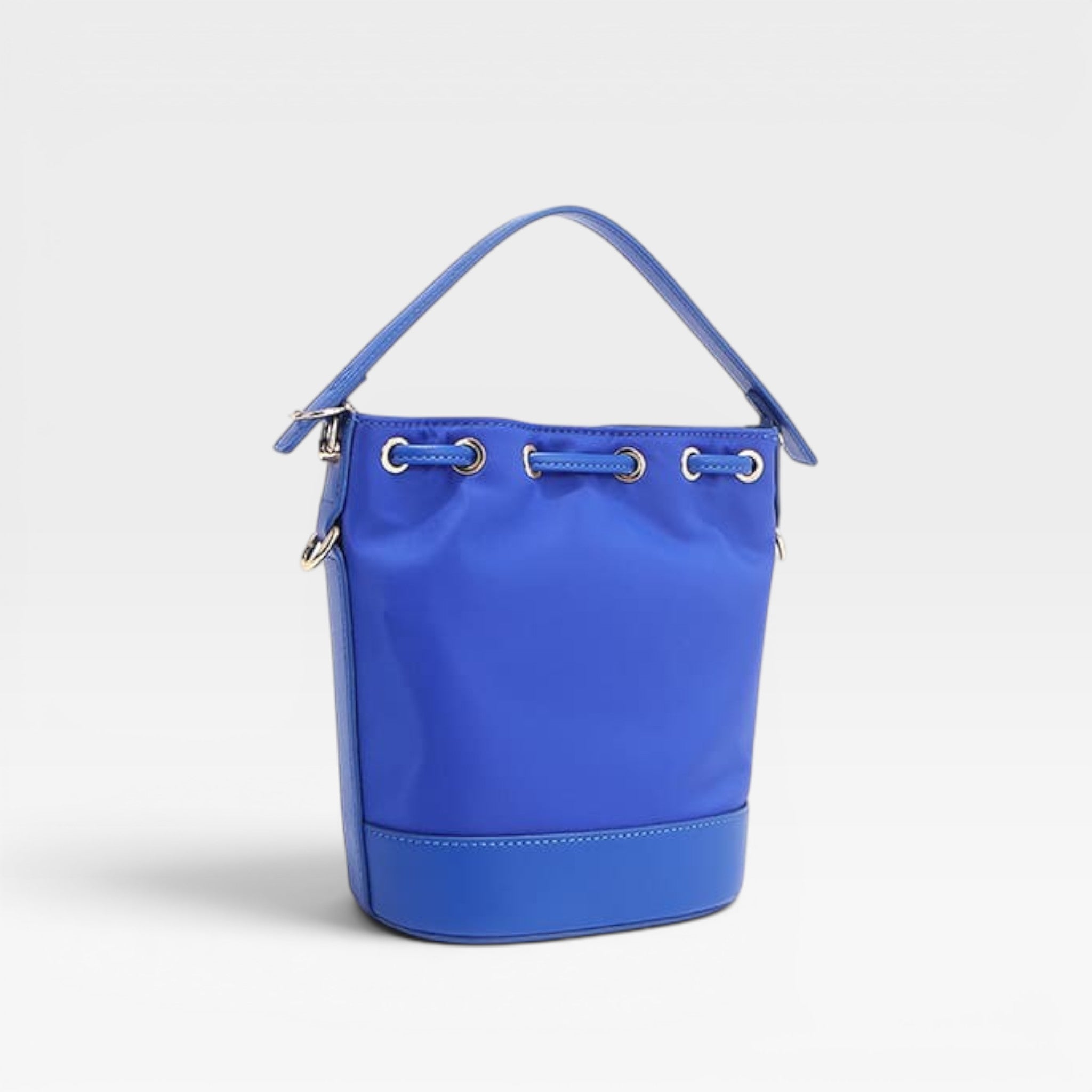 Blue bucket bag on a light gray background