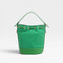 Green bucket bag with gold accents on a light gray background