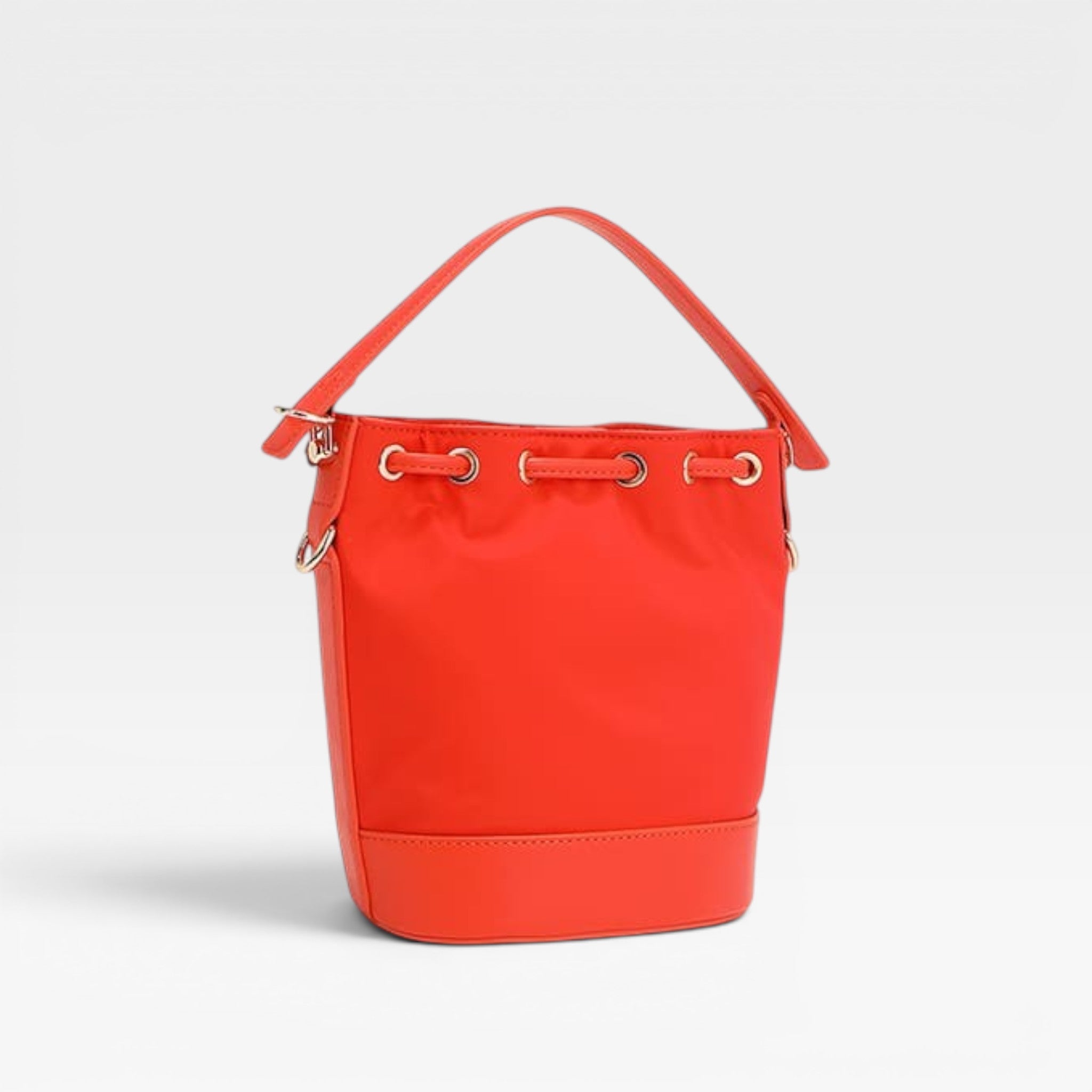 Red bucket bag on a light gray background