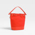 Red bucket bag on a light gray background