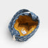 Blue fabric bag with yellow interior on a white background